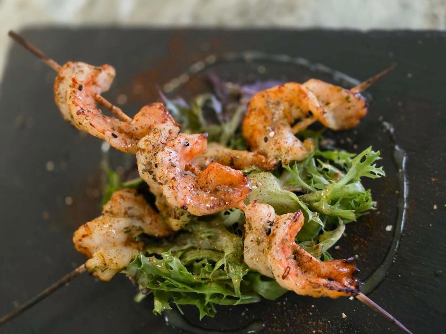 Grilled shrimp over greens at Twysted Vyne, Inverness FL